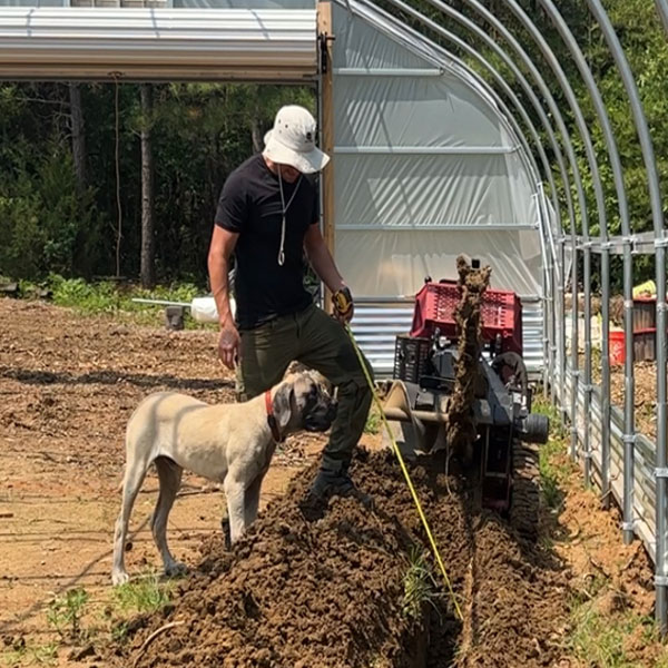 green team builder staff trenching for gardening and plant trees