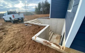 concrete outdoor construction of steps and slab retaining wall